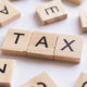 Understanding Tax lingo - tax is spelled out in scrabble letters