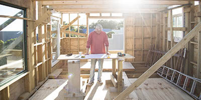 independent contractor working on a house.