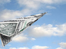 How Much Will I Get from The Covid-19 Stimulus Rebate Program? A paper airplane sails through a blue sky