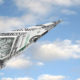 How Much Will I Get from The Covid-19 Stimulus Rebate Program? A paper airplane sails through a blue sky