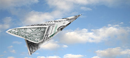 How Much Will I Get from The Covid-19 Stimulus Rebate Program? A paper airplane sails through a blue sky