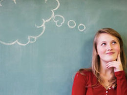 Trying to cheat the IRS? Think again! visual of a woman against a chalkboard visualizing