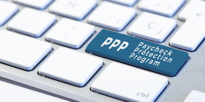 Loan Application Period for The Paycheck Protection Program Extended - A keyboard includes a blue key that stands out labeled PPP