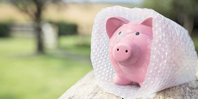 Need A Protective Claim Before July 15 - A ceramic piggybank is covered in protective bubblewrap