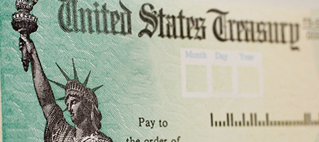 Still Waiting for The IRS To Cash Your Check? A photo of a IRS check - close up and personal