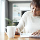 A woman looks over her tax return, checking out the full array of Tax Planning Opportunities