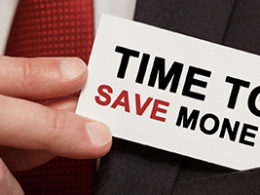 Tax Deductions Without Itemizing, a man wearing a business suit is holding a card stating "Time to save money"