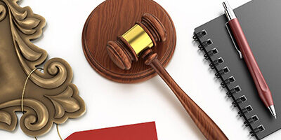 Tax Deductions Related to Charity Auctions, a gavel rests on a table