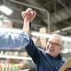 Maximize Your Tax Savings: An Owner’s Guide to Small Business Tax Deductions Two business men high five in an office space